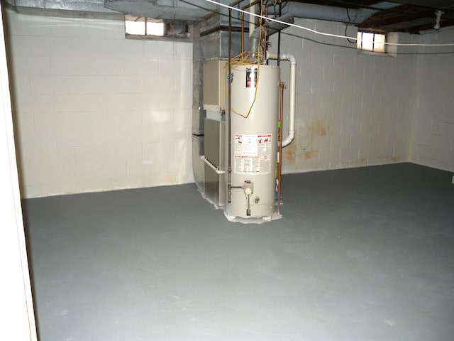 basement featuring water heater