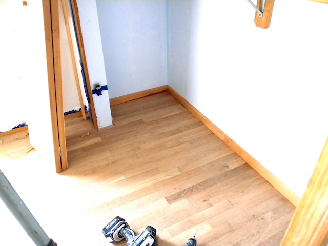 interior details featuring hardwood / wood-style flooring