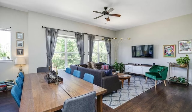 dining space featuring wood finished floors and ceiling fan