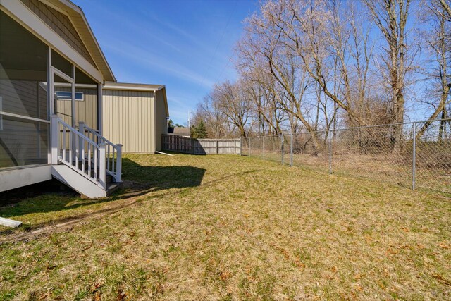 9363 S Grow Rd, Greenville, MI 48838 - view of yard featuring a sunroom