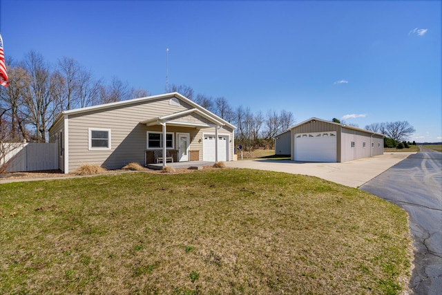 9363 S Grow Rd, Greenville, MI 48838 - view of front of home featuring a detached garage and an outdoor structure