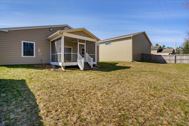9363 S Grow Rd, Greenville, MI 48838 - rear view of property featuring a sunroom and a ceiling fan