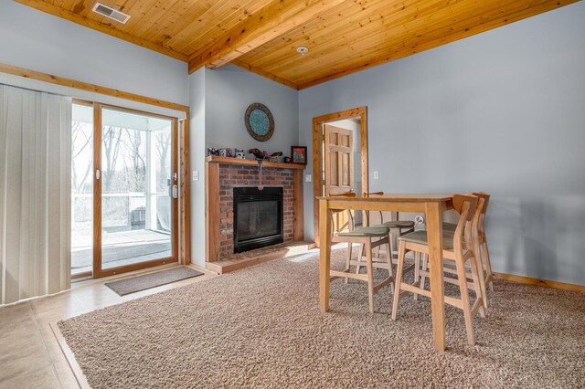 9363 S Grow Rd, Greenville, MI 48838 - dining space with wooden ceiling with exposed beams and a brick fireplace