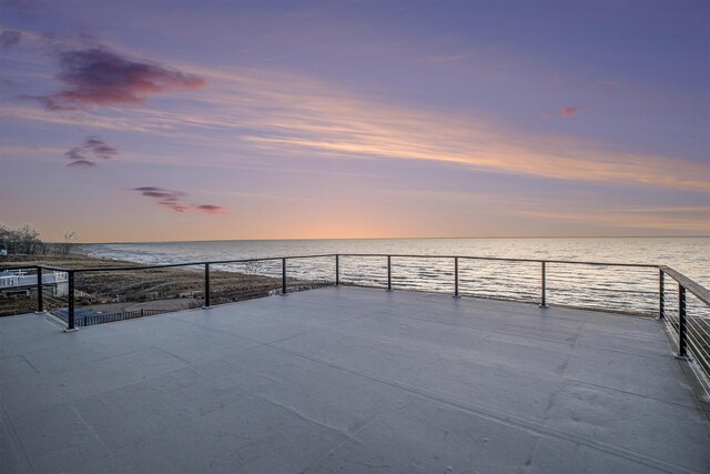 443 N Shore Dr, South Haven, MI 49090 - patio terrace at dusk with a water view