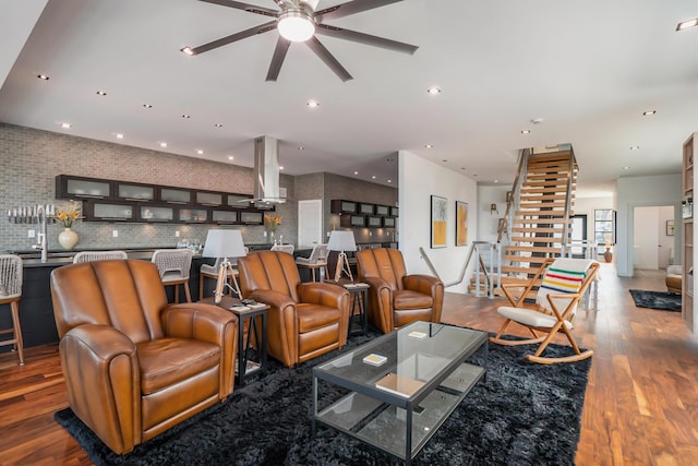 443 N Shore Dr, South Haven, MI 49090 - living area featuring a ceiling fan, wood finished floors, stairs, and recessed lighting