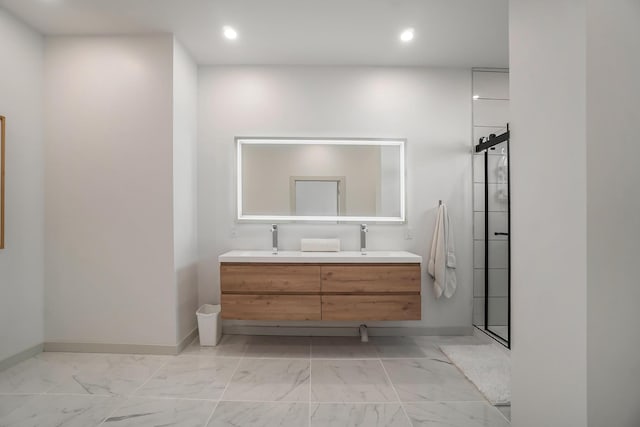 443 N Shore Dr, South Haven, MI 49090 - bathroom with marble look tile flooring, double vanity, recessed lighting, baseboards, and a shower
