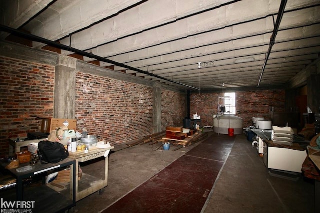 basement with brick wall