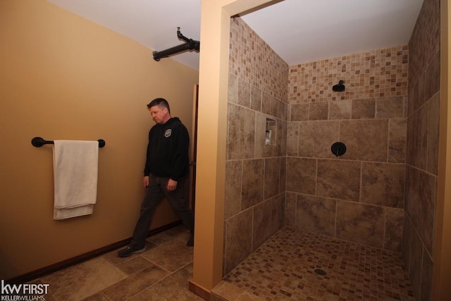 bathroom featuring tiled shower