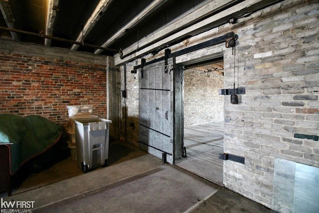 basement featuring brick wall