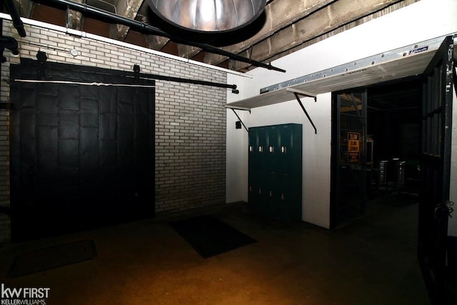 basement with brick wall