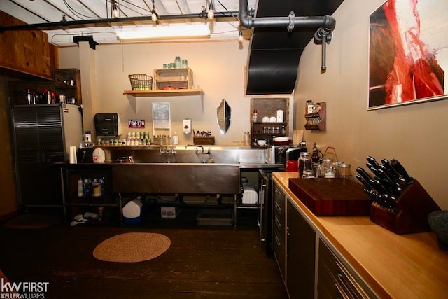 kitchen with dark wood-type flooring