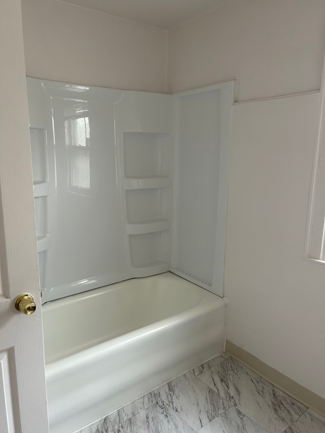 bathroom featuring shower / bath combination