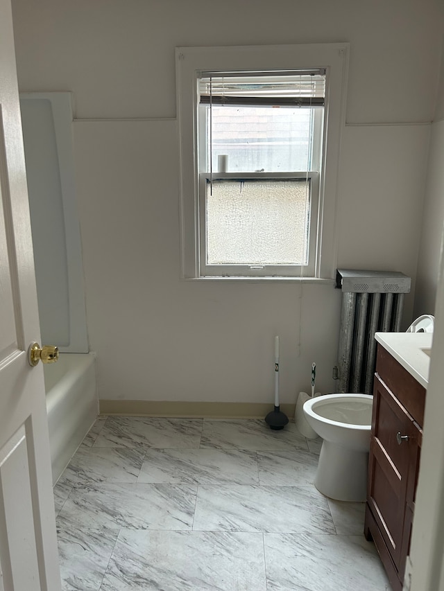full bathroom with vanity, toilet, and  shower combination