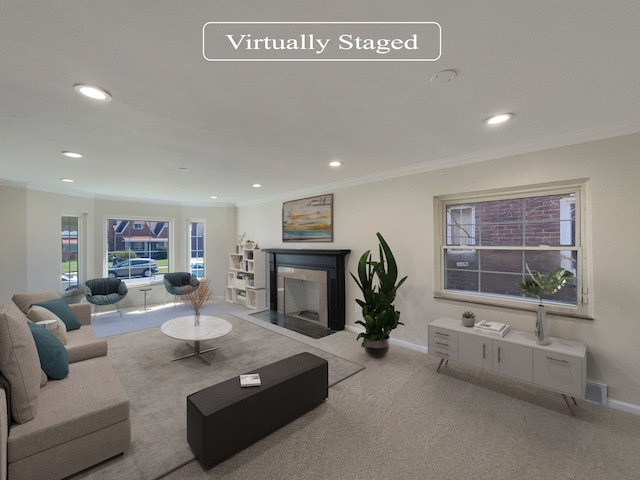 living room featuring ornamental molding and light carpet