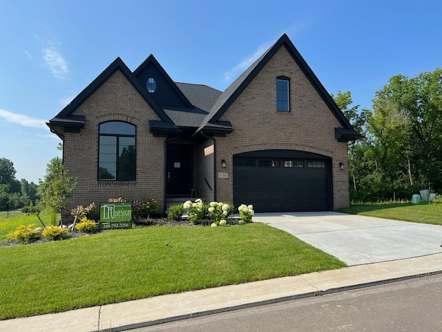 french country inspired facade with a garage and a front lawn