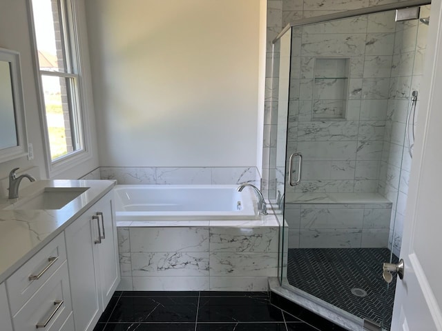 bathroom with tile patterned floors, vanity, and plus walk in shower