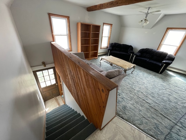 carpeted living room featuring lofted ceiling with beams and ceiling fan