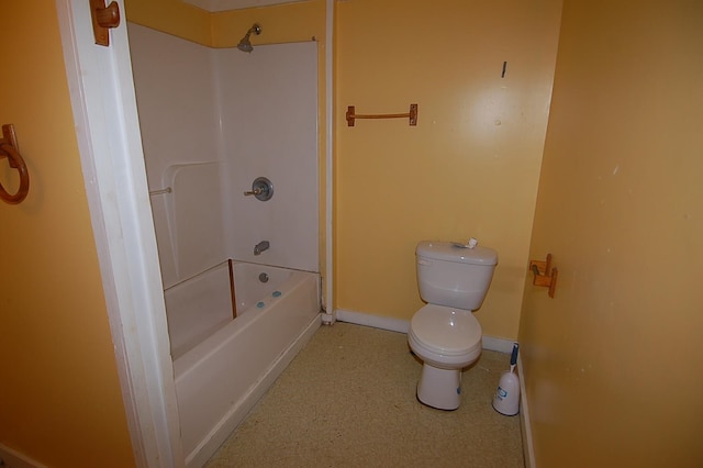 bathroom with toilet and shower / washtub combination