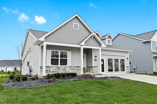 362 Jubilee Dr, Whitmore Lake, MI 48189 - craftsman inspired home featuring board and batten siding, covered porch, and a front yard