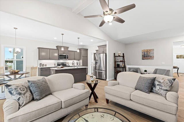 362 Jubilee Dr, Whitmore Lake, MI 48189 - living area with ceiling fan, light wood finished floors, a chandelier, recessed lighting, and ornamental molding