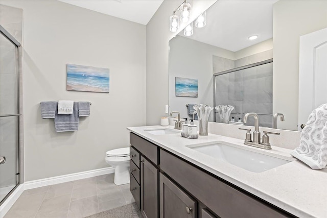 362 Jubilee Dr, Whitmore Lake, MI 48189 - bathroom with double vanity, a stall shower, baseboards, toilet, and tile patterned flooring