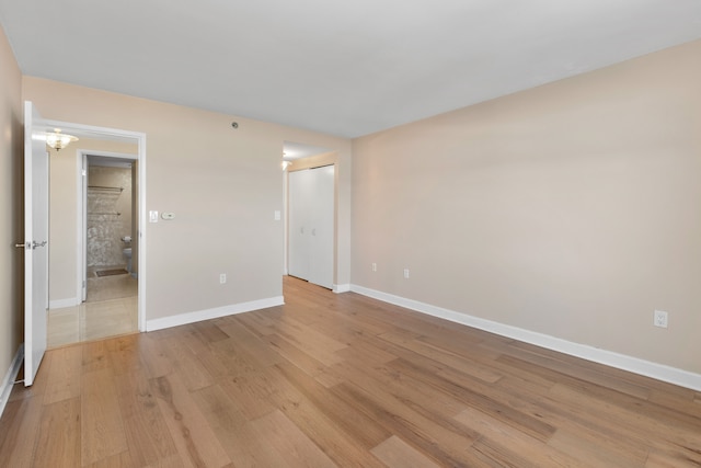 empty room with light wood-type flooring