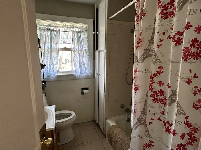 full bathroom with toilet, shower / bath combo, vanity, and tile patterned floors