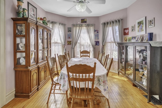 dining room featuring ceiling fan and light wood-type flooring