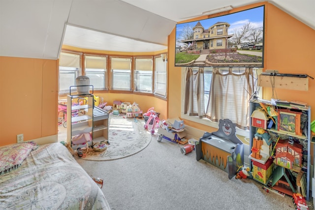 game room with carpet flooring and vaulted ceiling