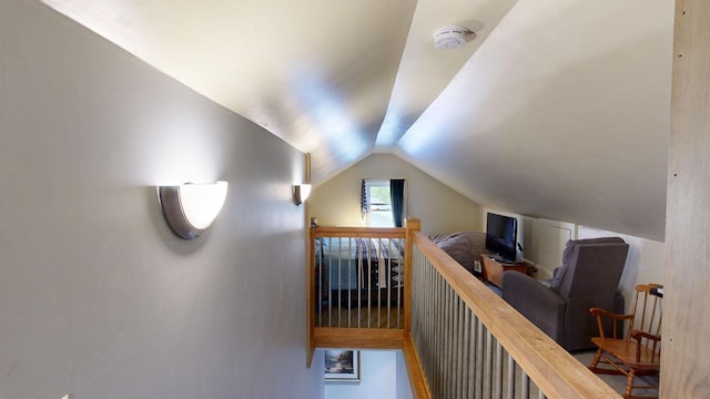 corridor with vaulted ceiling