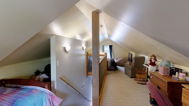 bedroom with light colored carpet and lofted ceiling