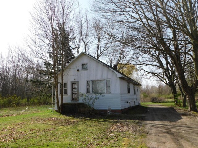 1976 Townline Rd, Benton Harbor, MI 49022 - view of front of property featuring a chimney and driveway