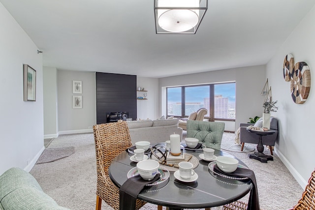 view of carpeted dining space