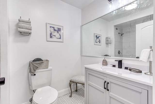 5000 Town Ctr Unit 2205, Southfield, MI 48075 - bathroom with toilet, baseboards, vanity, and a shower