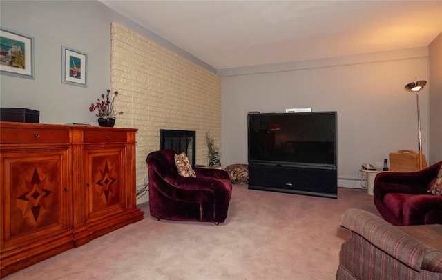 living room with light carpet, a fireplace, and a baseboard heating unit