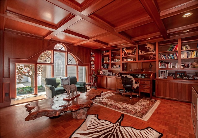 home office featuring wood walls, wooden ceiling, coffered ceiling, built in shelves, and beamed ceiling