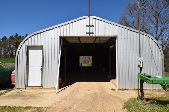 view of outbuilding featuring a garage