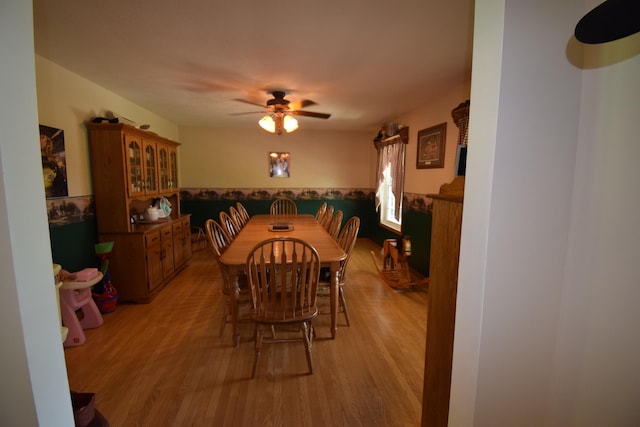 dining room featuring ceiling fan and light wood-type flooring