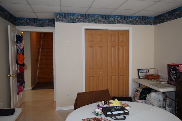 dining space featuring a paneled ceiling