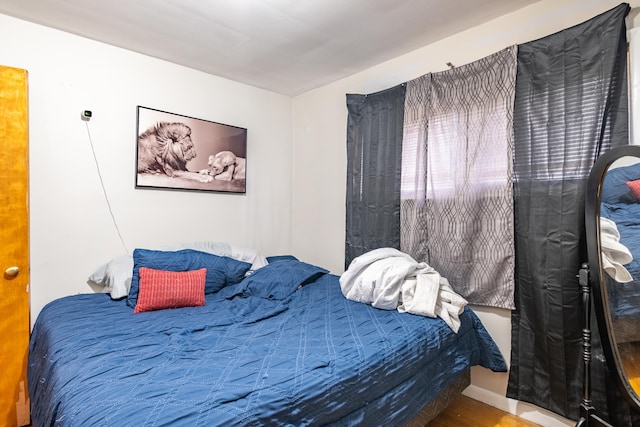 bedroom featuring hardwood / wood-style floors