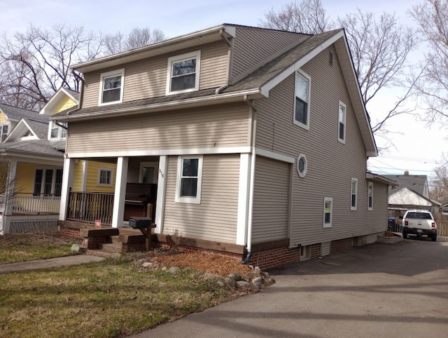 view of property with a porch