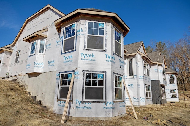 12258 Tullymore Dr, Stanwood, MI 49346 - view of side of home