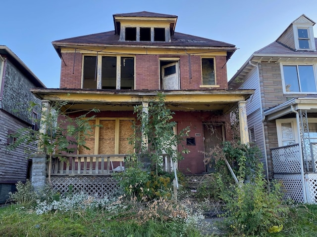 view of front of home featuring covered porch