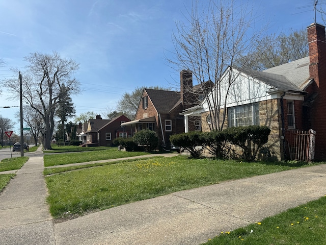 view of property exterior featuring a yard