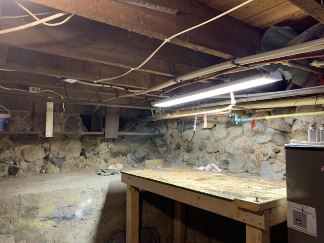 412 N Darling Ave, Fremont, MI 49412 - unfinished basement featuring oil tank