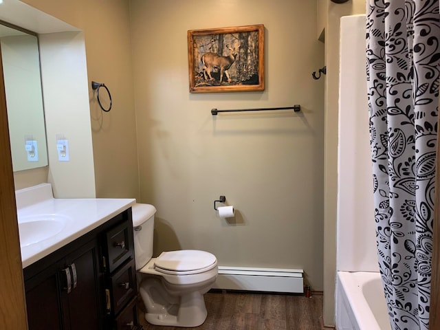 full bathroom featuring shower / bath combination with curtain, vanity, a baseboard radiator, hardwood / wood-style flooring, and toilet