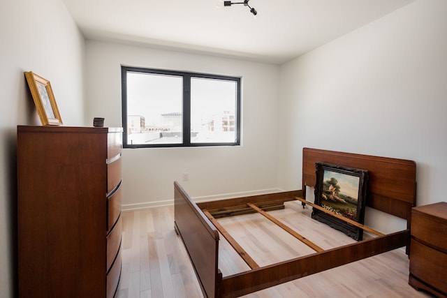 bedroom featuring light wood-type flooring