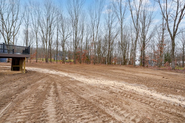 view of yard with a wooden deck