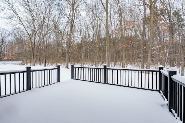 view of snow covered deck