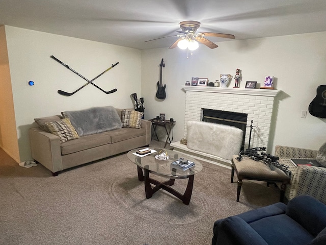 carpeted living room with ceiling fan and a brick fireplace